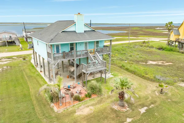 a view of a swimming pool with an ocean view