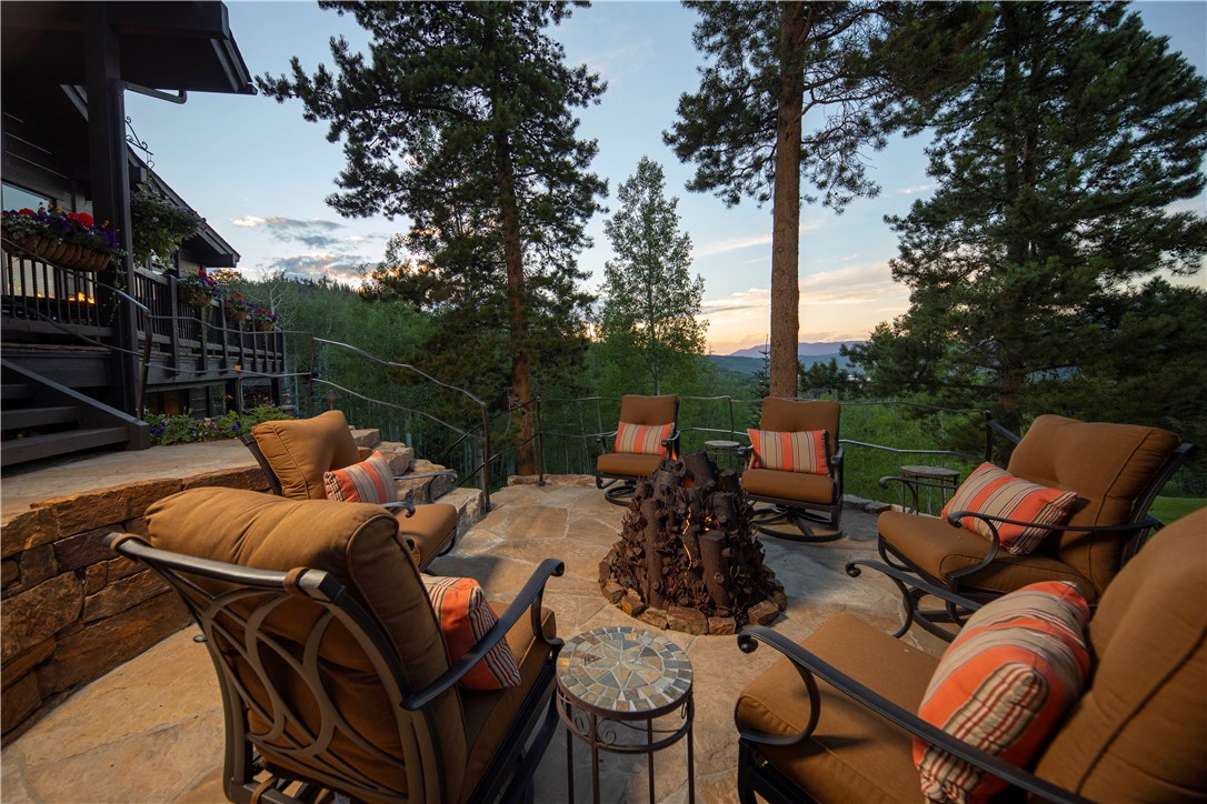 130 Hunter's Knob Road Silverthorne, CO 80498 - Photo 35 of 35 Custom outdoor iron fire sculpture by Breckenridge Ironworks is a focal point of the outdoor terrace. Listen closely to the sounds of the creek as it rambles down the subtle falls of the 16th hole.