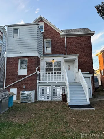 front view of a house with a small yard