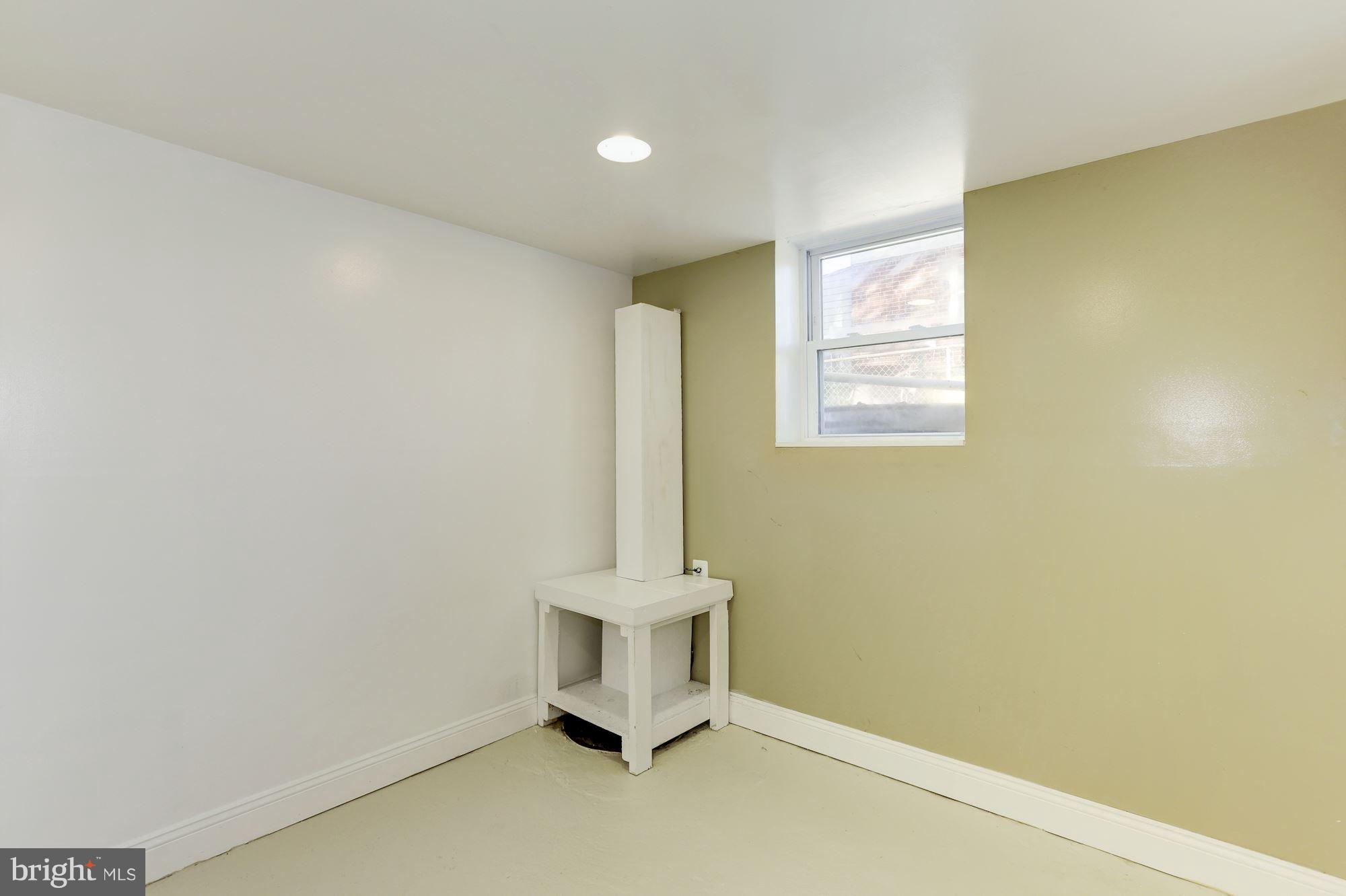 5018 Laguna Road College Park, MD 20740 - Photo 21 of 30 an empty room with a window