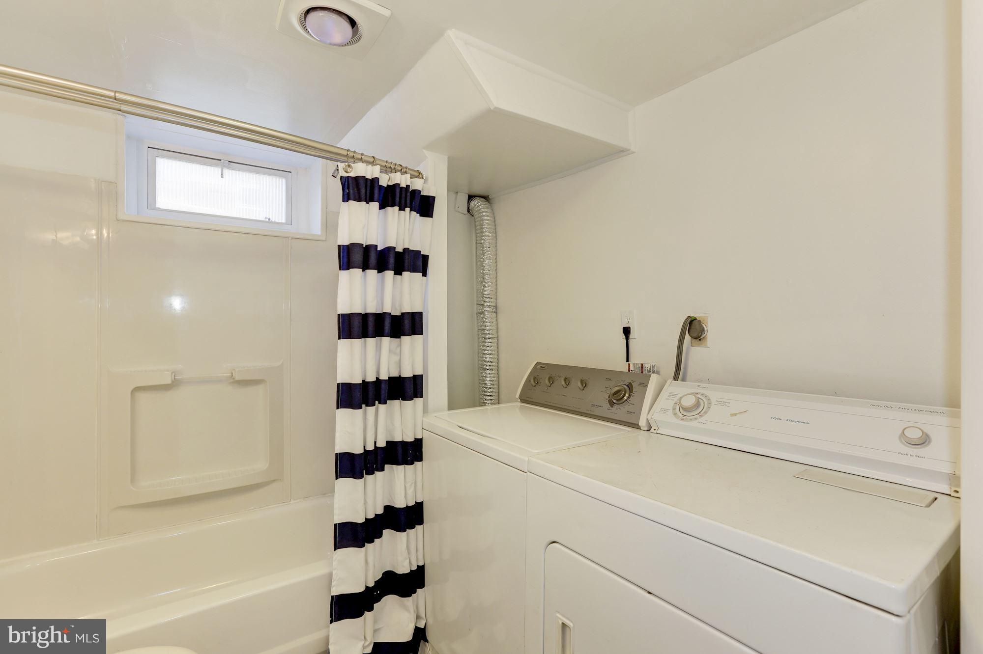 5018 Laguna Road College Park, MD 20740 - Photo 24 of 30 a utility room with dryer and washer