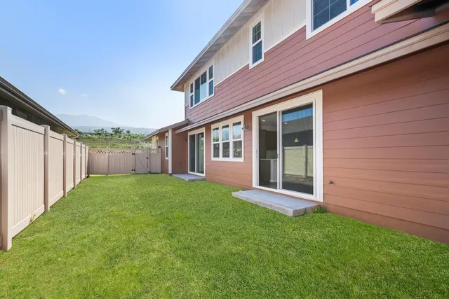 a view of an house with backyard porch and entertaining space