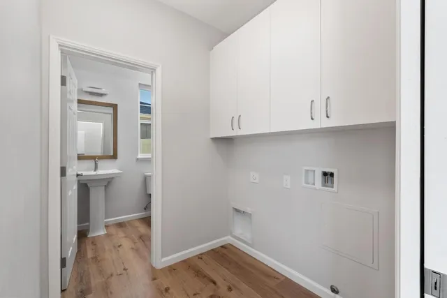 a view of cabinets and wooden floor