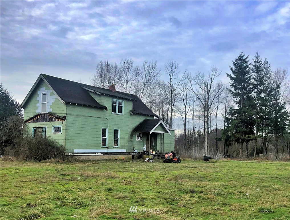 7575 Bruce Road Custer, WA 98240 - Photo 2 of 7 a front view of a house with garden