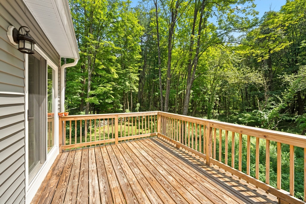 190 Lower Gore Road Webster, MA 01570 - Photo 11 of 41 a view of balcony with deck and wooden floor