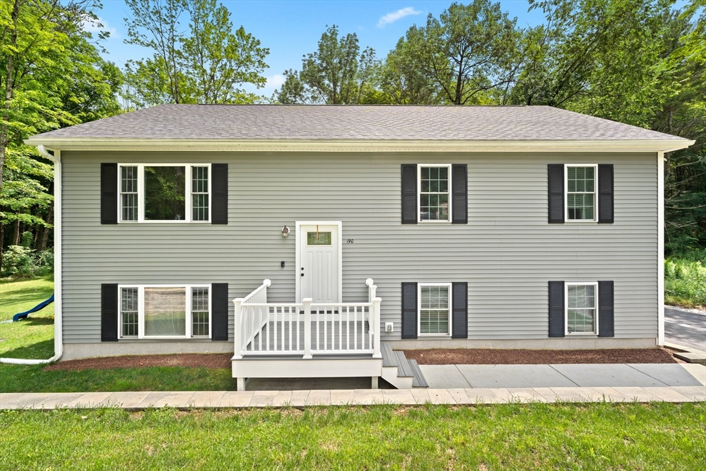 190 Lower Gore Road Webster, MA 01570 - Photo 4 of 41 a house with a garden view