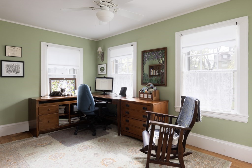 175 Mt Vernon Street Newton, MA 02465 - Photo 12 of 21 a view of a workspace with furniture and a window