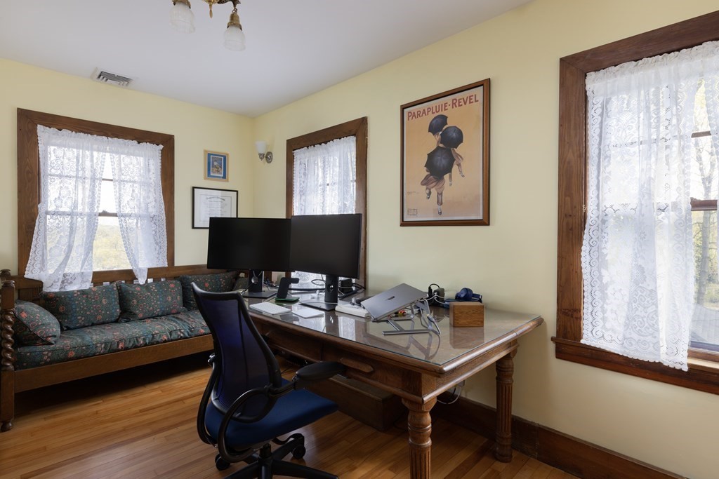 175 Mt Vernon Street Newton, MA 02465 - Photo 13 of 21 a view of a livingroom with furniture and a window