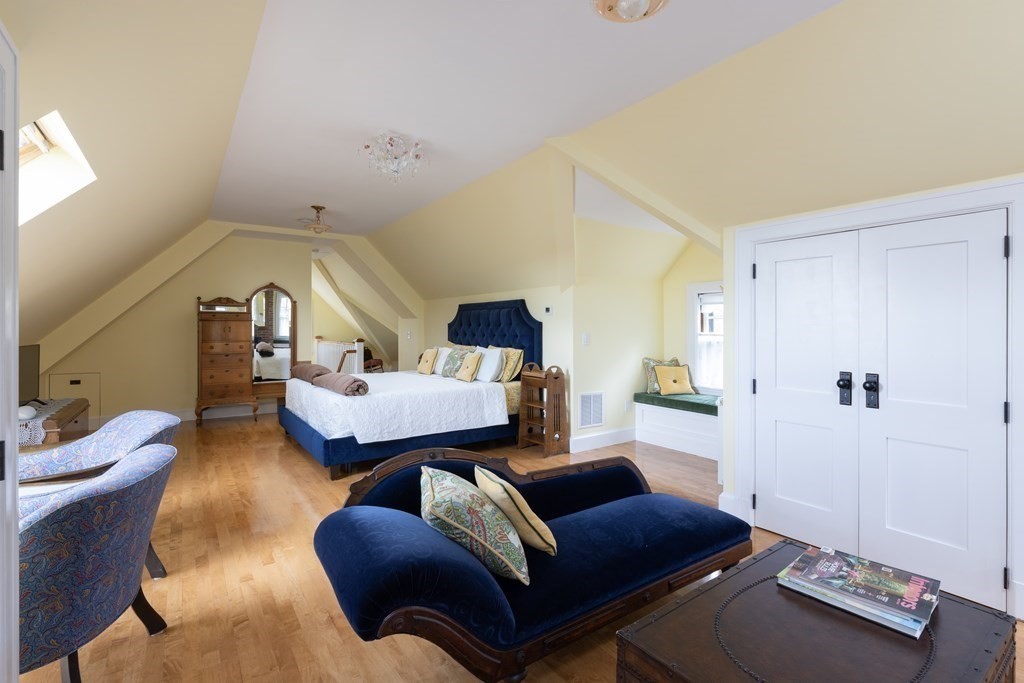 175 Mt Vernon Street Newton, MA 02465 - Photo 16 of 21 a living room with furniture and a window