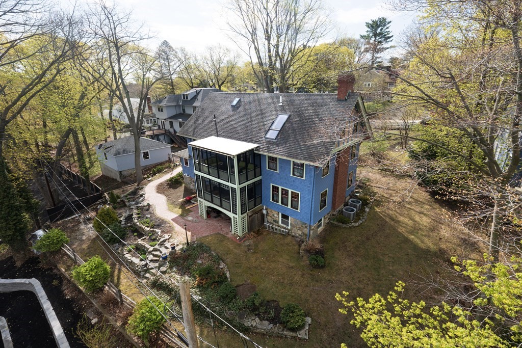 175 Mt Vernon Street Newton, MA 02465 - Photo 18 of 21 a view of a house with a yard chairs and table chair