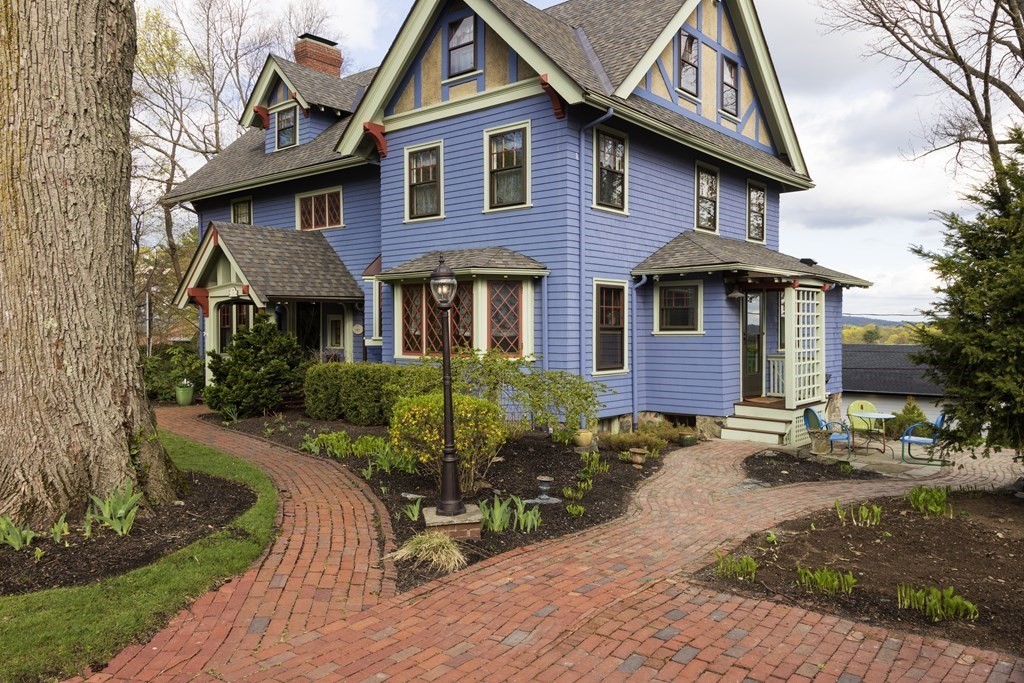 175 Mt Vernon Street Newton, MA 02465 - Photo 3 of 21 a front view of a house with a yard