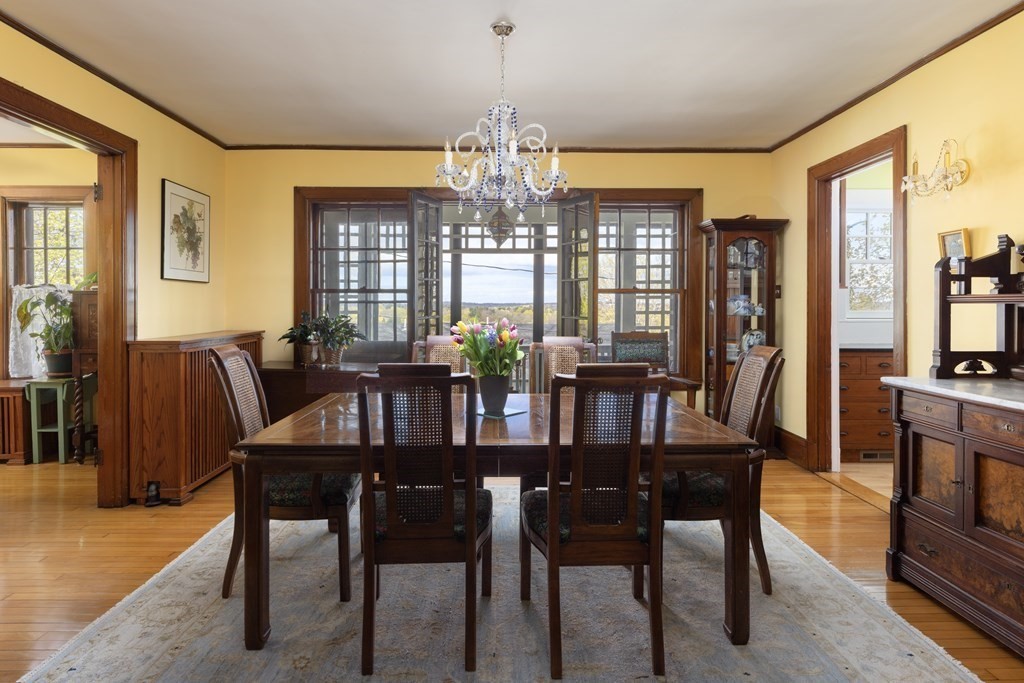 175 Mt Vernon Street Newton, MA 02465 - Photo 4 of 21 a view of a dining room with furniture window and wooden floor