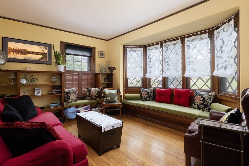 175 Mt Vernon Street Newton, MA 02465 - Photo 7 of 21 a living room with furniture and a window