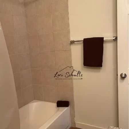 a bathroom with a bathtub