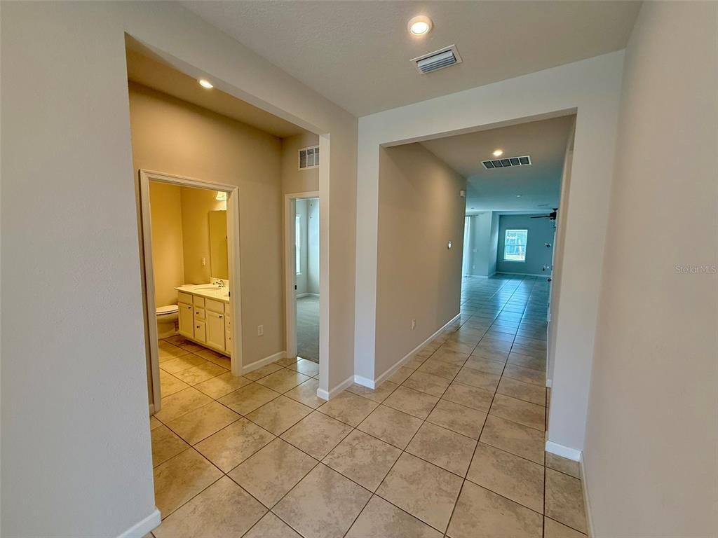 5576 Vigo Loop St. Cloud, FL 34771 - Photo 15 of 17 wooden floor in a room