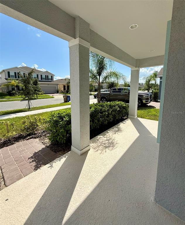5576 Vigo Loop St. Cloud, FL 34771 - Photo 2 of 17 a view of a building from a outdoor space