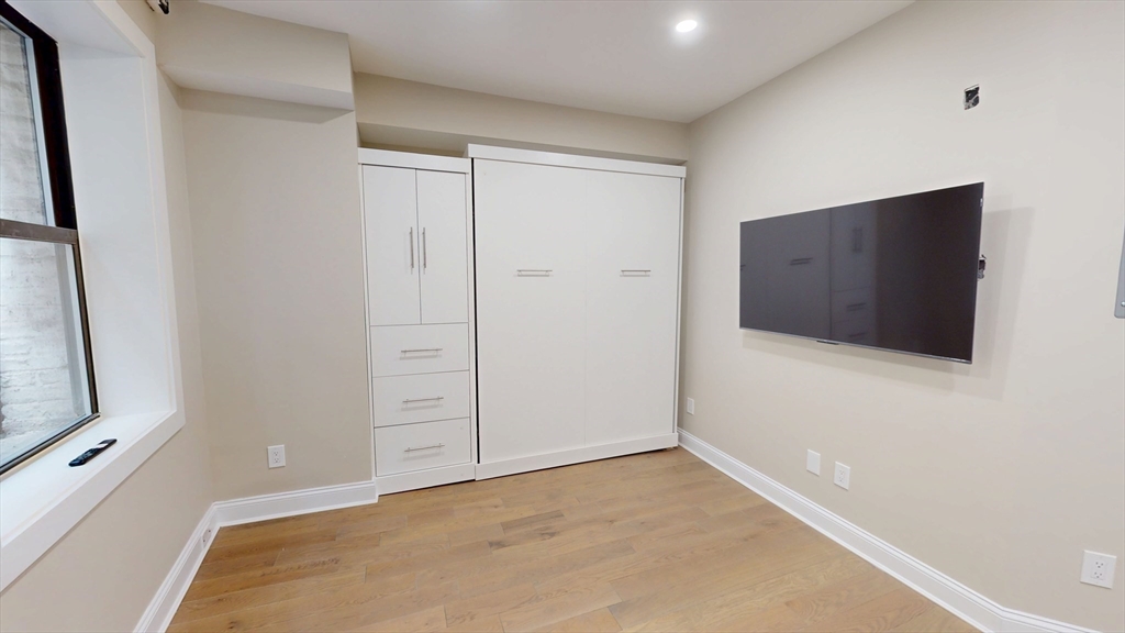 31-35 India Street, Unit 202 Boston, MA 02109 - Photo 4 of 5 a view of an empty room