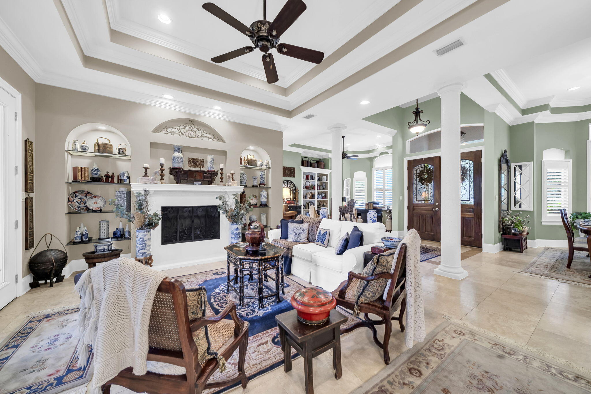 4470 Stonebridge Road Destin, FL 32541 - Photo 13 of 114 a living room with fireplace furniture and a view of kitchen