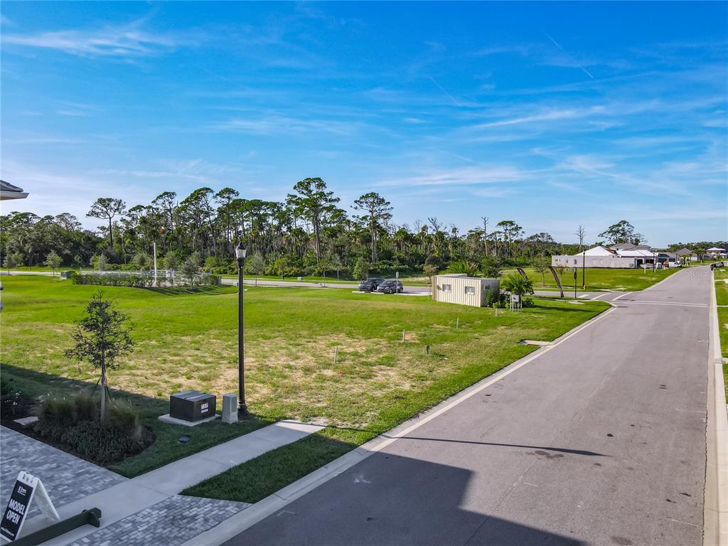 81 Coronado Road Flagler Beach, FL 32136 - Photo 12 of 27 a view of a lake with a big yard