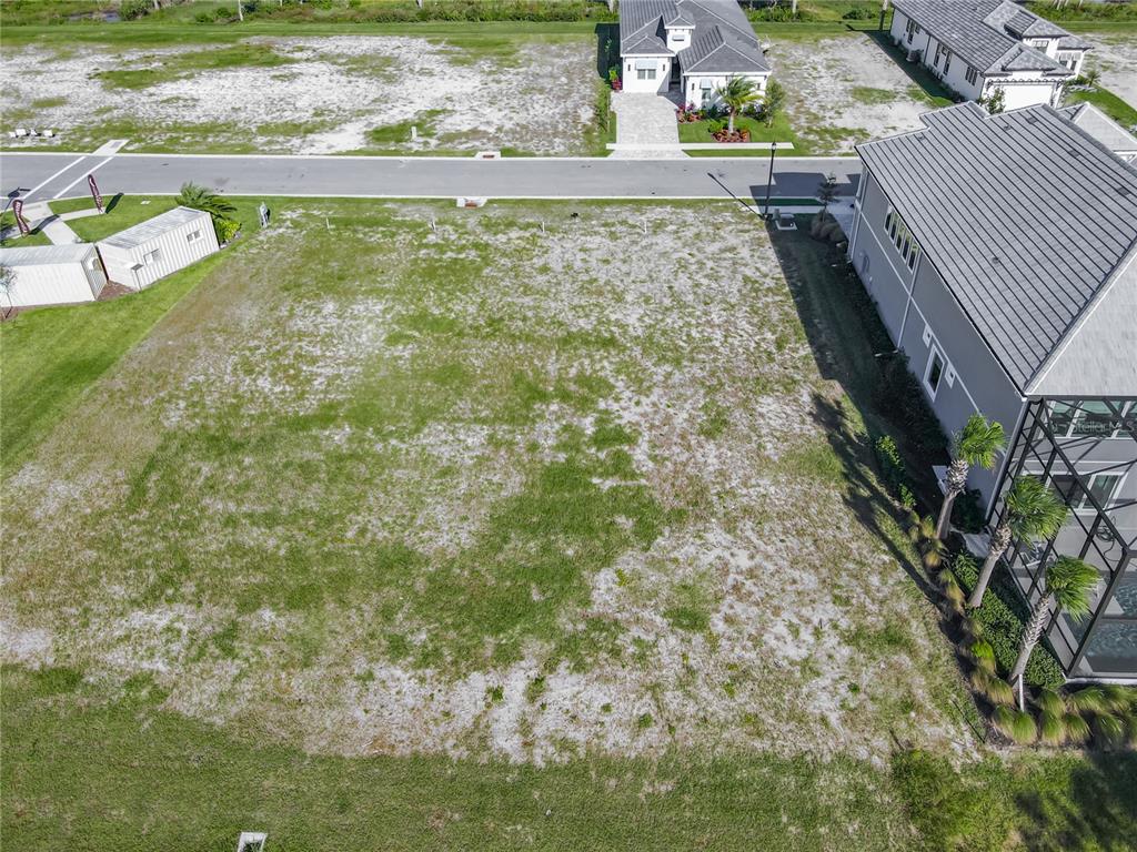 81 Coronado Road Flagler Beach, FL 32136 - Photo 15 of 27 a view of swimming pool with a yard and seating area