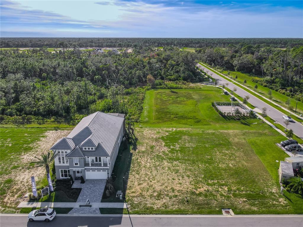 81 Coronado Road Flagler Beach, FL 32136 - Photo 2 of 27 a view of a lake with a outdoor space
