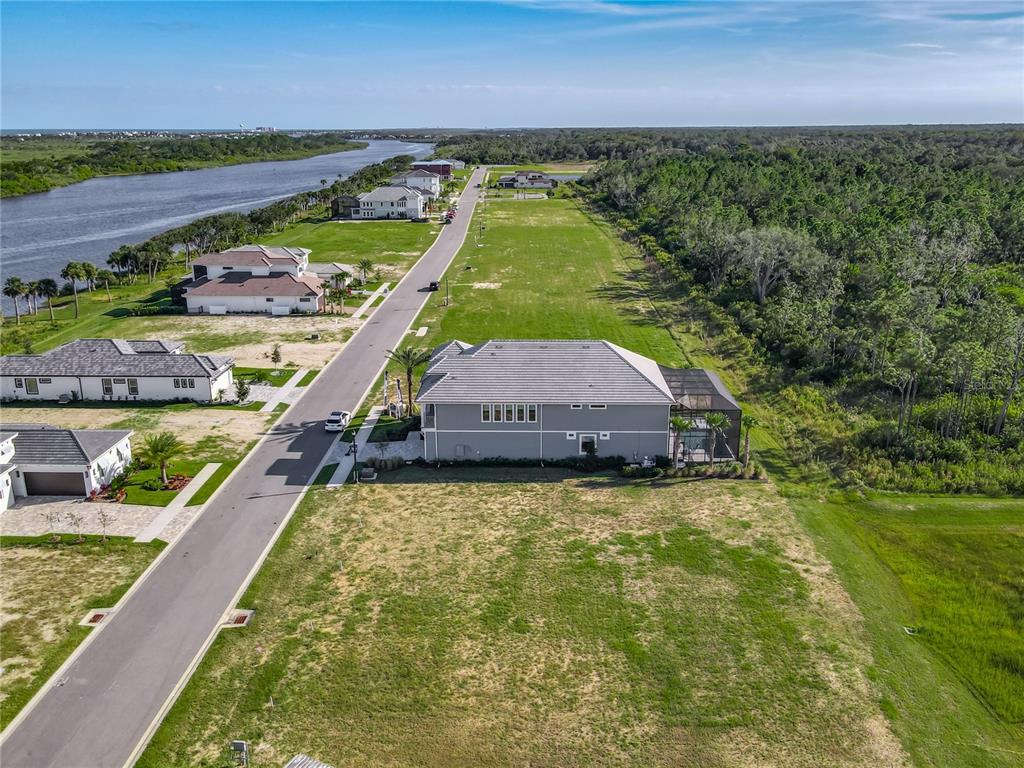 81 Coronado Road Flagler Beach, FL 32136 - Photo 22 of 27 a view of swimming pool with a yard