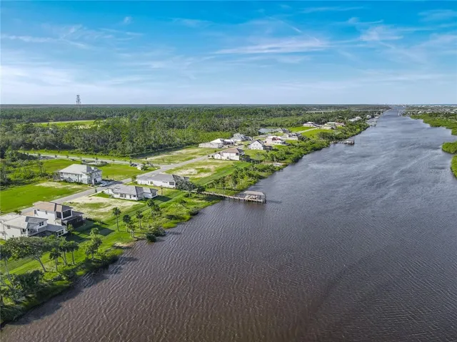 a view of a street with an ocean