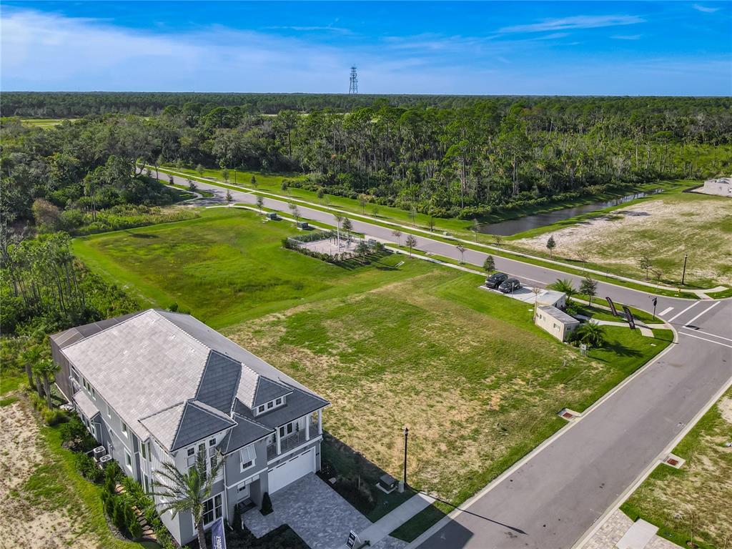 81 Coronado Road Flagler Beach, FL 32136 - Photo 5 of 27 a view of a swimming pool with an outdoor seating and lake view