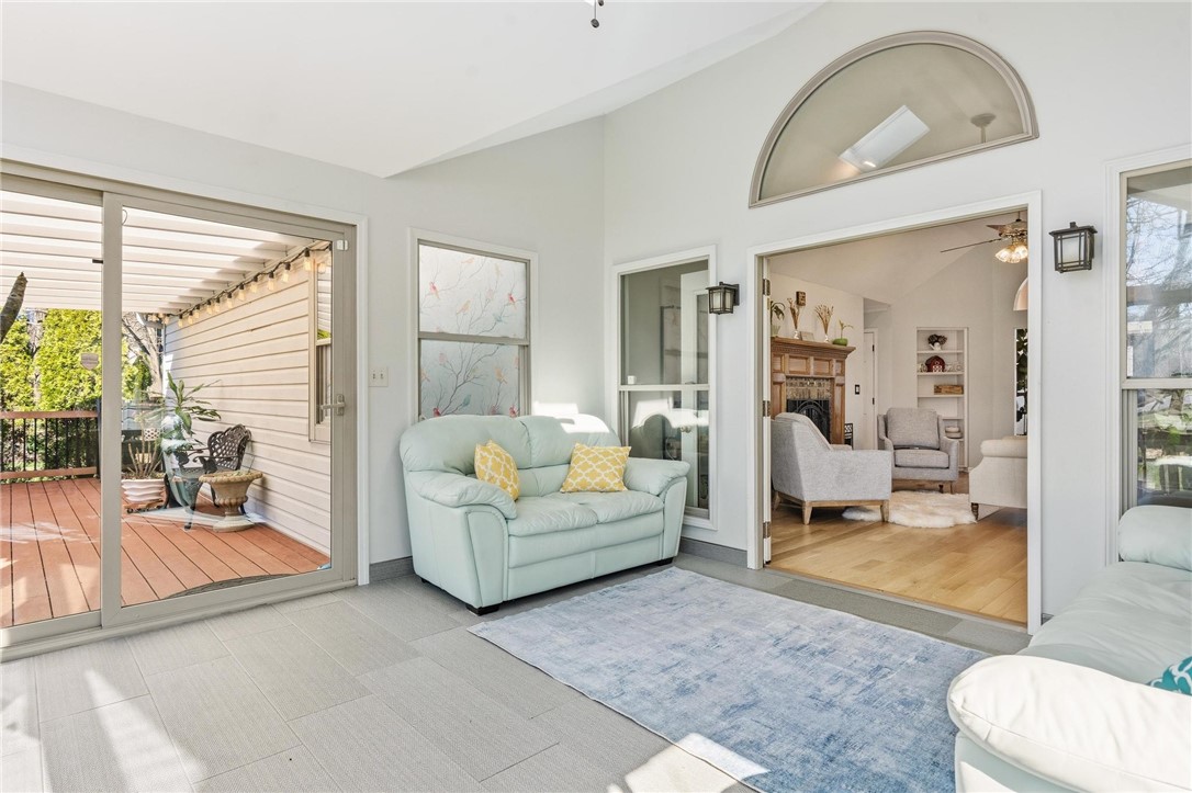 8781 Rupp Farm Drive West Chester, OH 45069 - Photo 12 of 48 This sunlit space seamlessly connects indoor comfort with outdoor tranquility, offering a versatile living area.