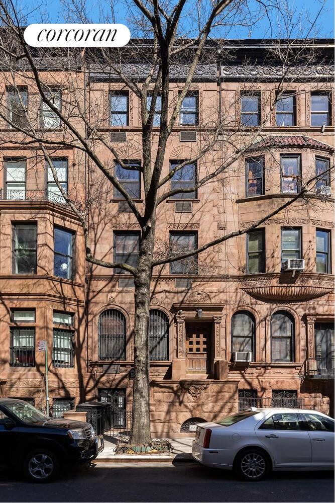 161 West 76th Street, Unit 3F Manhattan, NY 10023 - Photo 6 of 8 a car parked in front of a building