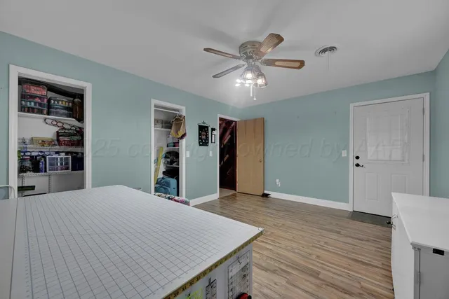 a view of a building with sitting area