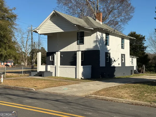 a view of a house with a patio