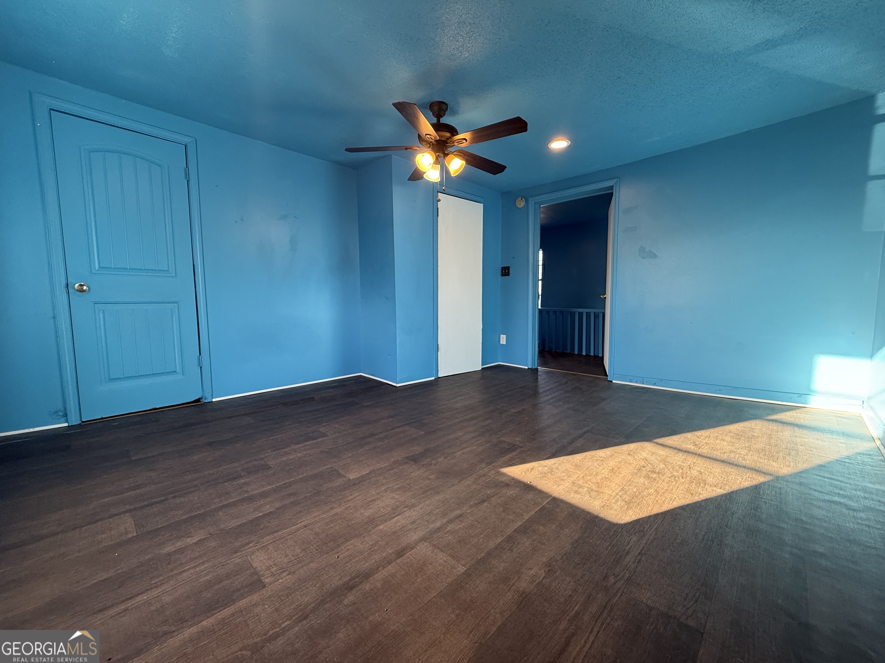 803 Pine Street Fort Valley, GA 31030 - Photo 15 of 22 a view of empty room with wooden floor