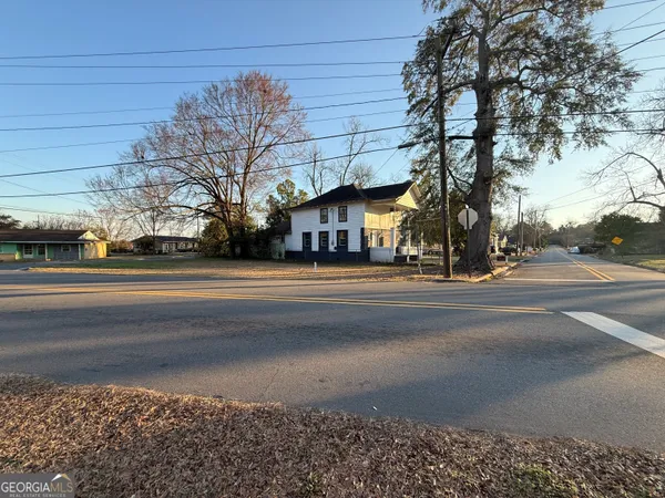 a view of street with houses