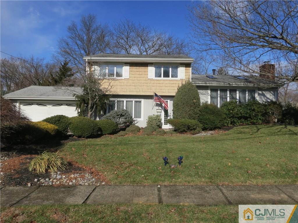 6 Colburn Road East Brunswick, NJ 08816 - Photo 1 of 24 a front view of a house with a yard