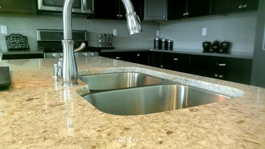 3601 176th Place Southeast, Unit 2009 Bothell, WA 98012 - Photo 6 of 19 a view of a kitchen counter space