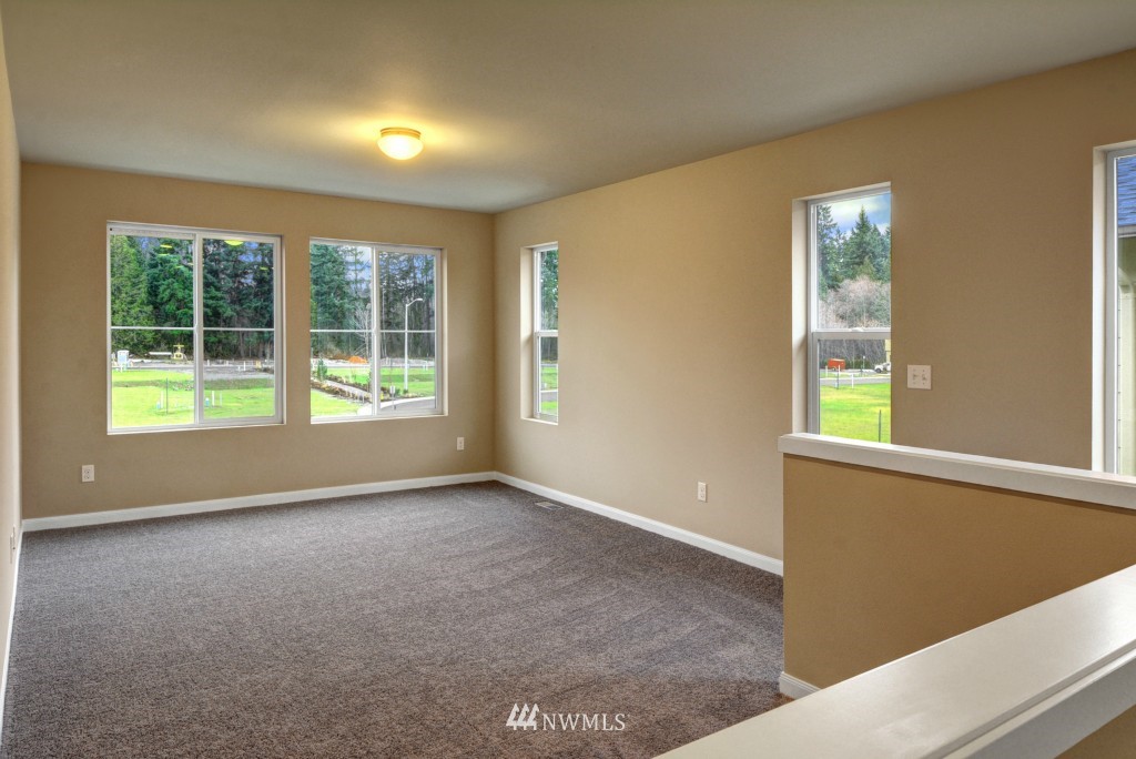 3601 176th Place Southeast, Unit 2009 Bothell, WA 98012 - Photo 8 of 19 a view of an empty room with a window