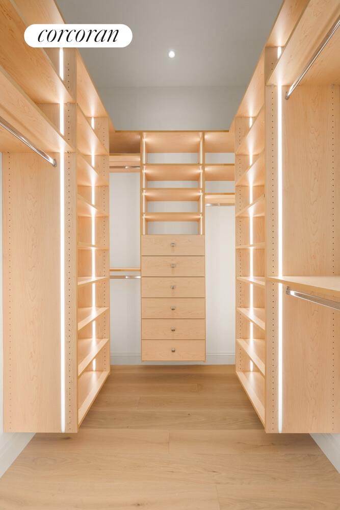 700 Monroe Street Brooklyn, NY 11221 - Photo 11 of 18 a view of walk in closet with empty racks