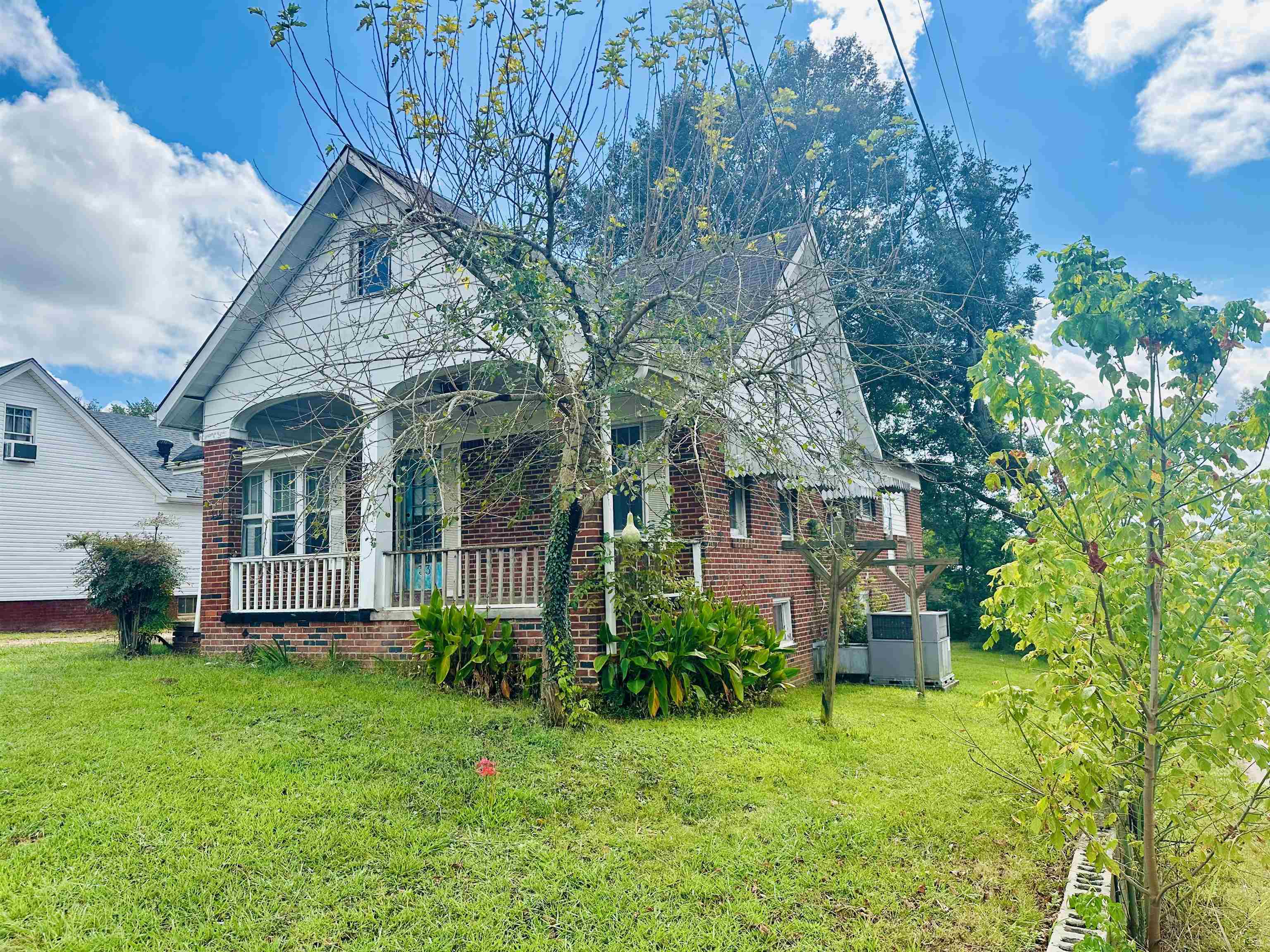 332 Pharr Avenue Selmer, TN 38375 - Photo 26 of 27 a view of a house with a garden