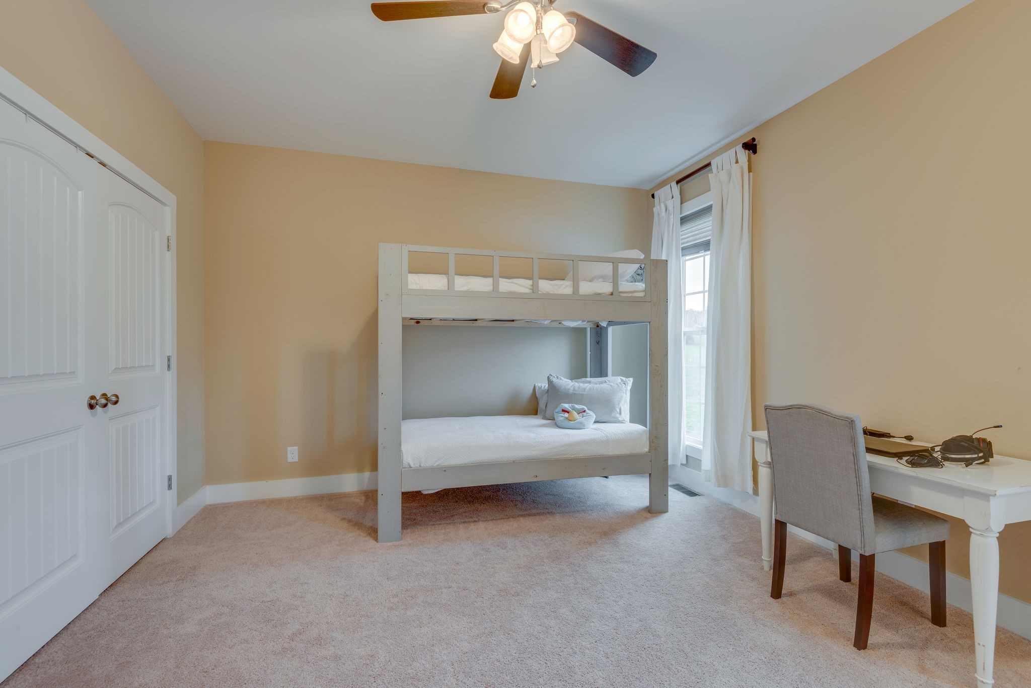 872 Tidwell Road Burns, TN 37029 - Photo 23 of 26 a bed room with a bed and a chair