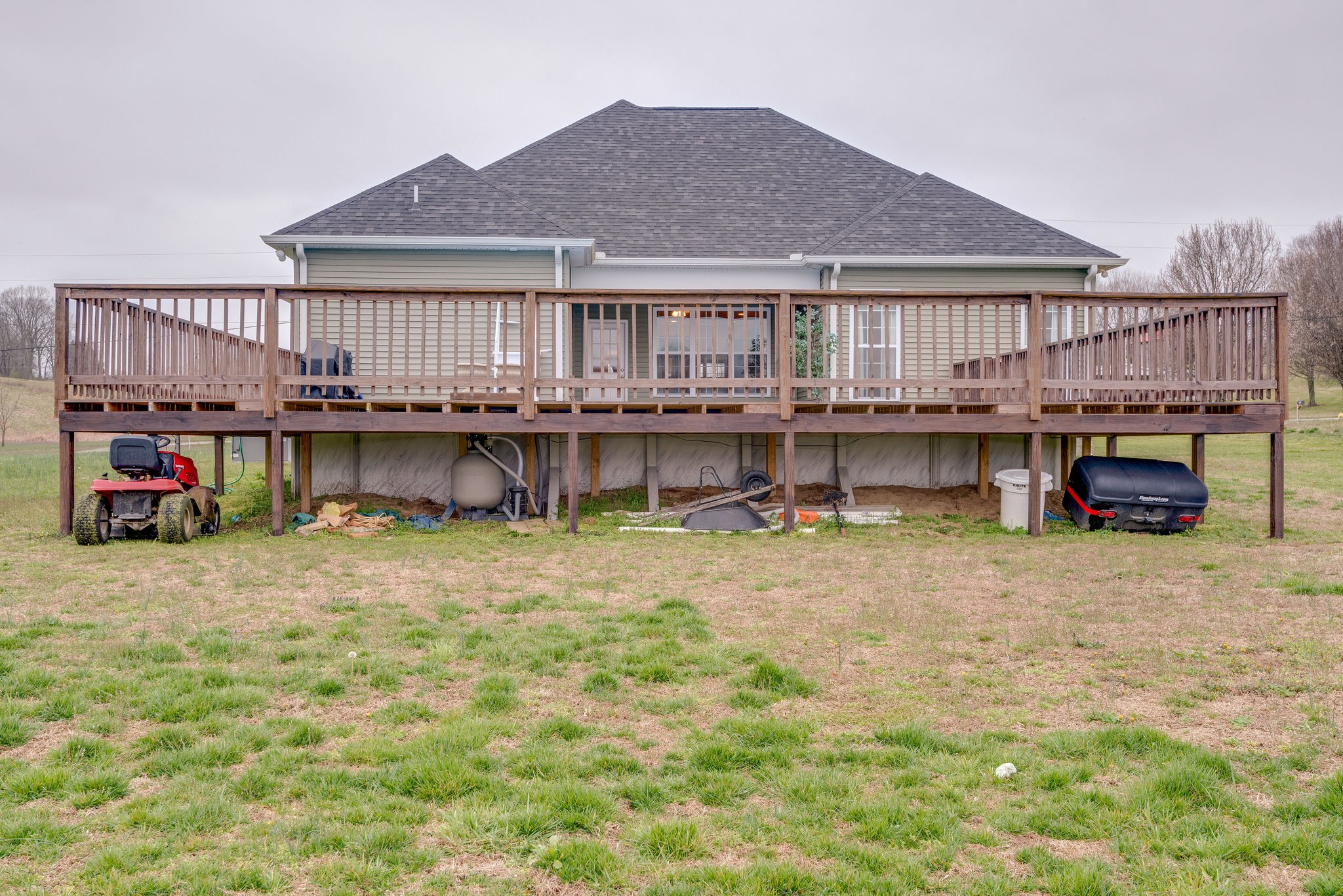 872 Tidwell Road Burns, TN 37029 - Photo 26 of 26 a view of a house with roof deck and chair