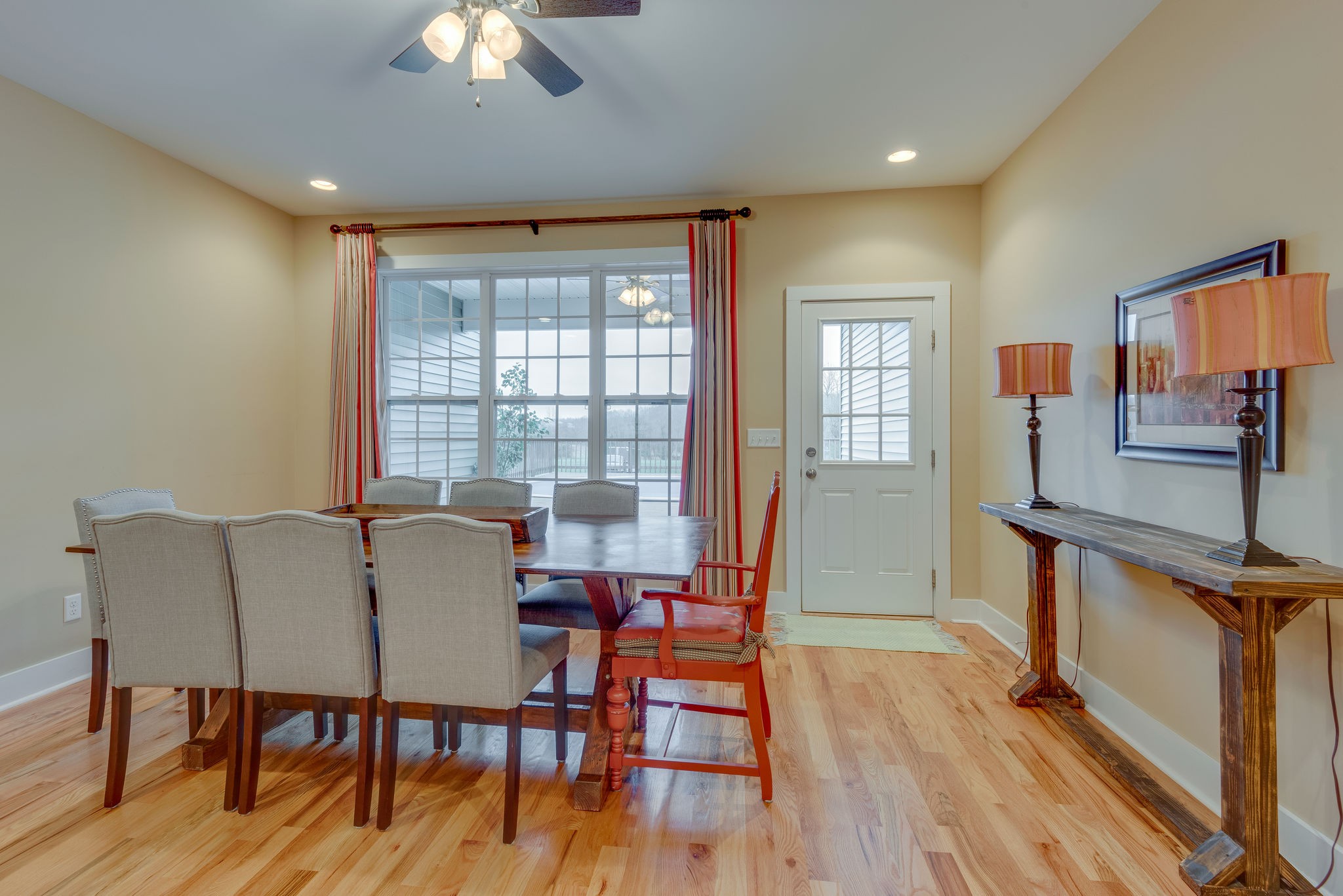 872 Tidwell Road Burns, TN 37029 - Photo 9 of 26 a view of a dining room with furniture window and wooden floor