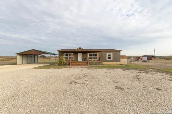 a front view of house with yard