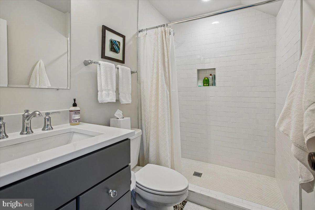 1909 Belfield Road Alexandria, VA 22307 - Photo 46 of 69 Modern bathroom with sleek finishes.