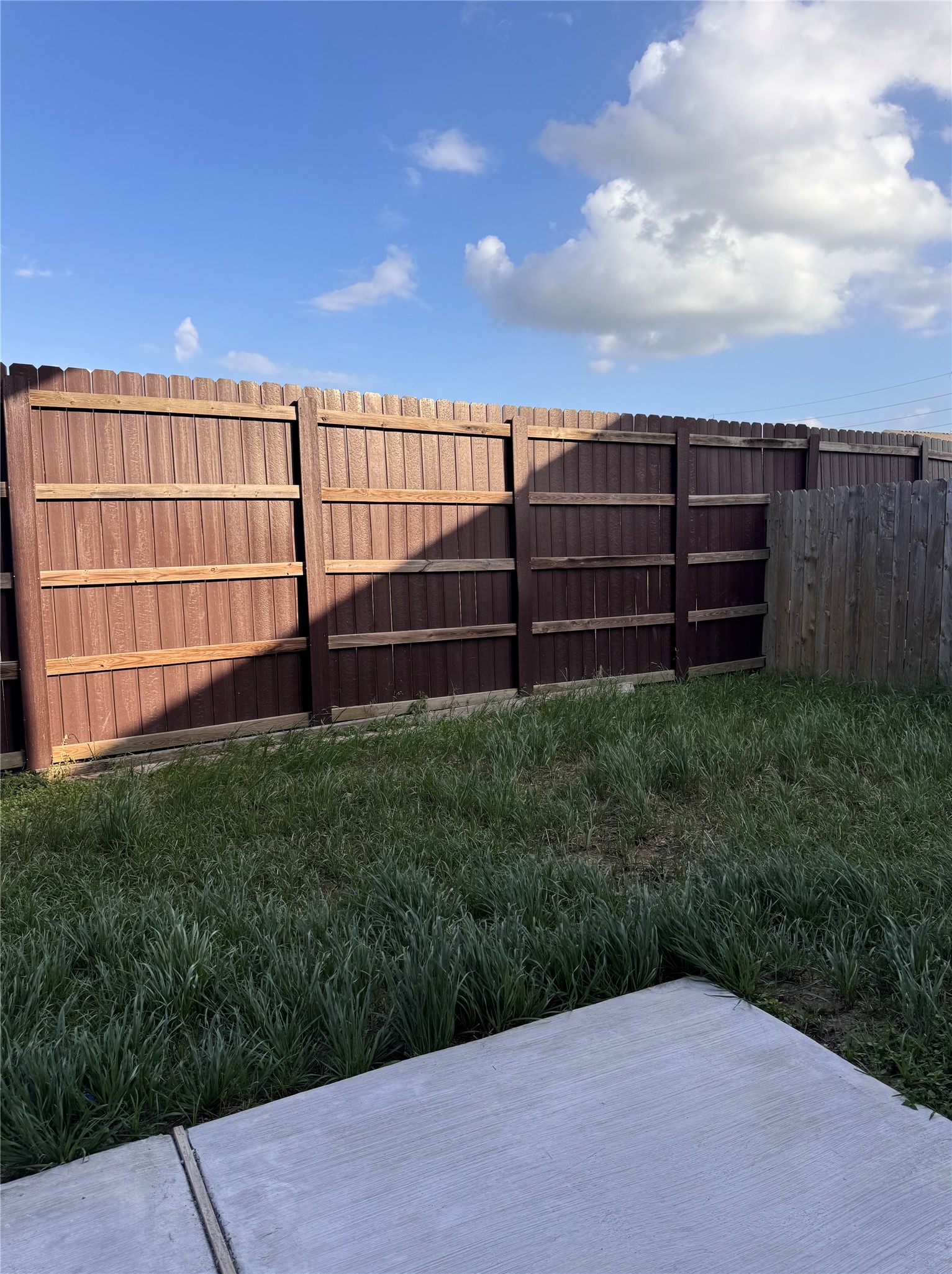 15931 Winston Point Lane Houston, TX 77084 - Photo 15 of 15 a view of backyard with wooden fence