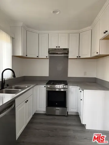 a view of a terrace with furniture