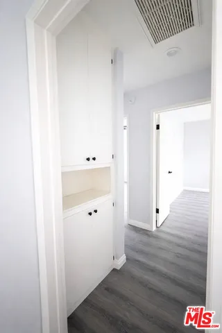 a bathroom with a shower and a toilet