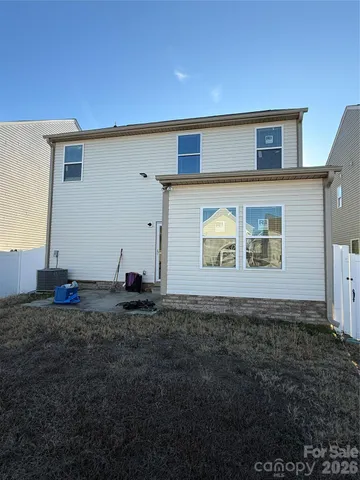 a view of a back yard of the house