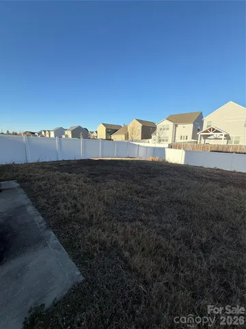 a view of a big yard next to a building