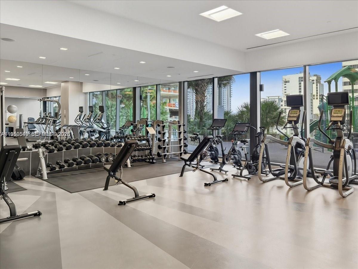 88 Southwest 7th Street, Unit 2104 Miami, FL 33130 - Photo 30 of 50 a view of a room with gym equipment